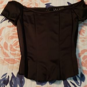 Two piece black satin evening top and skirt.